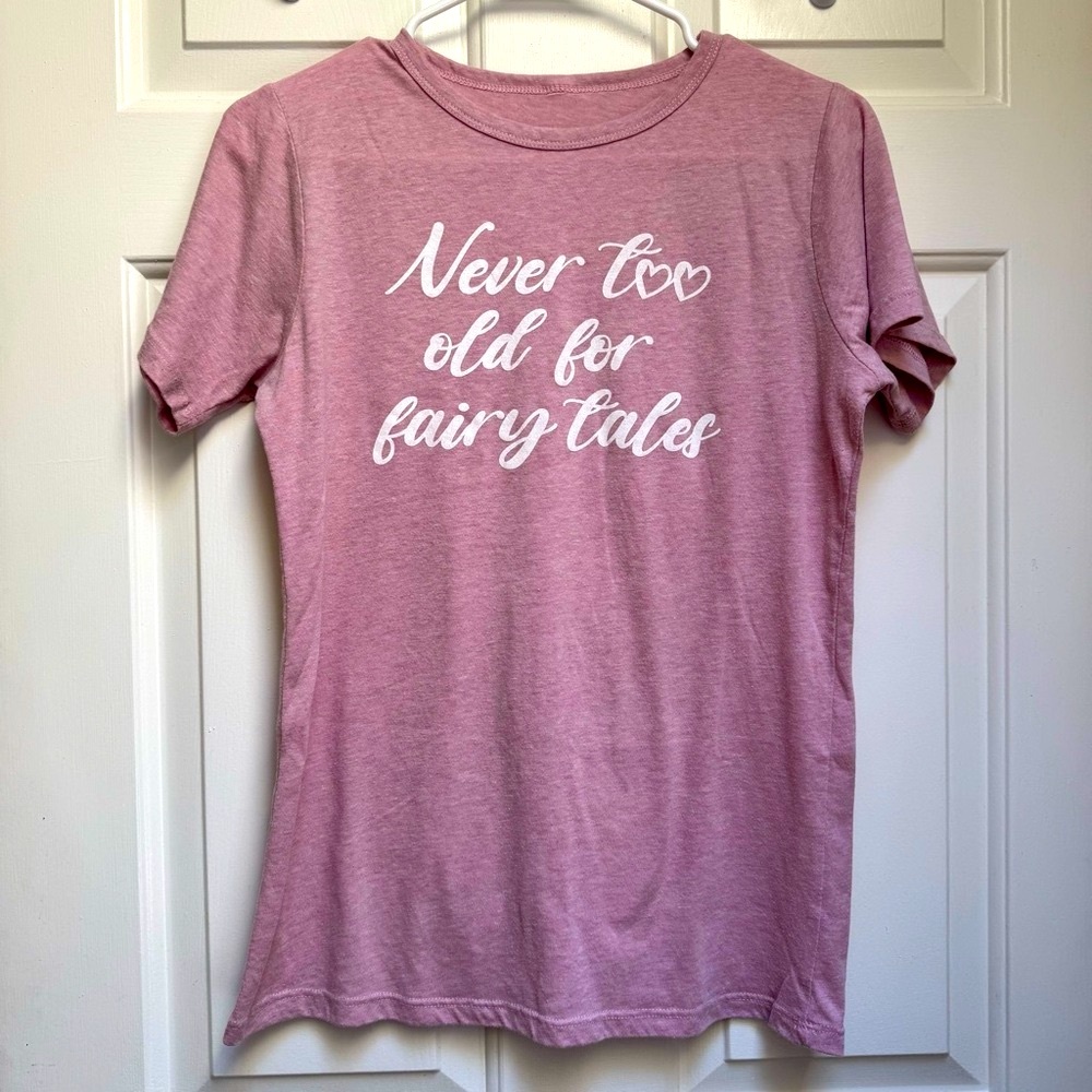 Never Too Old For Fairy Tales Pink Tshirt womens size M
Ptp 18.5-23"